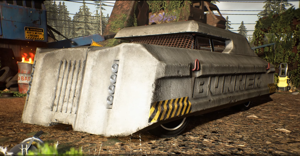 Gray armored vehicle parked in scrapyard setting