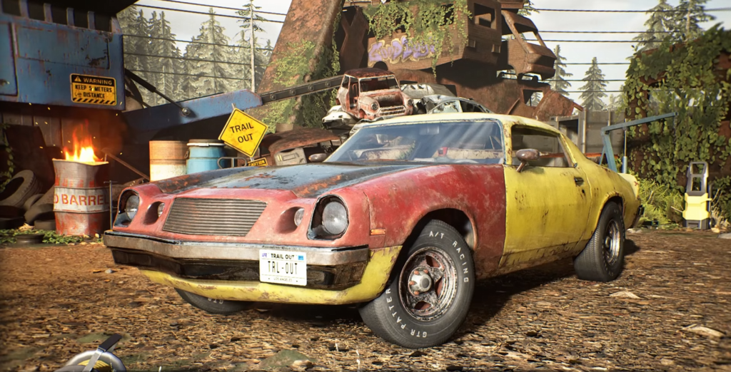 Red and yellow car parked in scrapyard