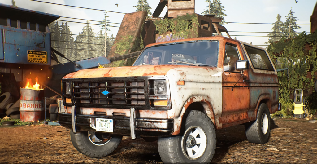Rusty orange SUV parked in scrapyard yard