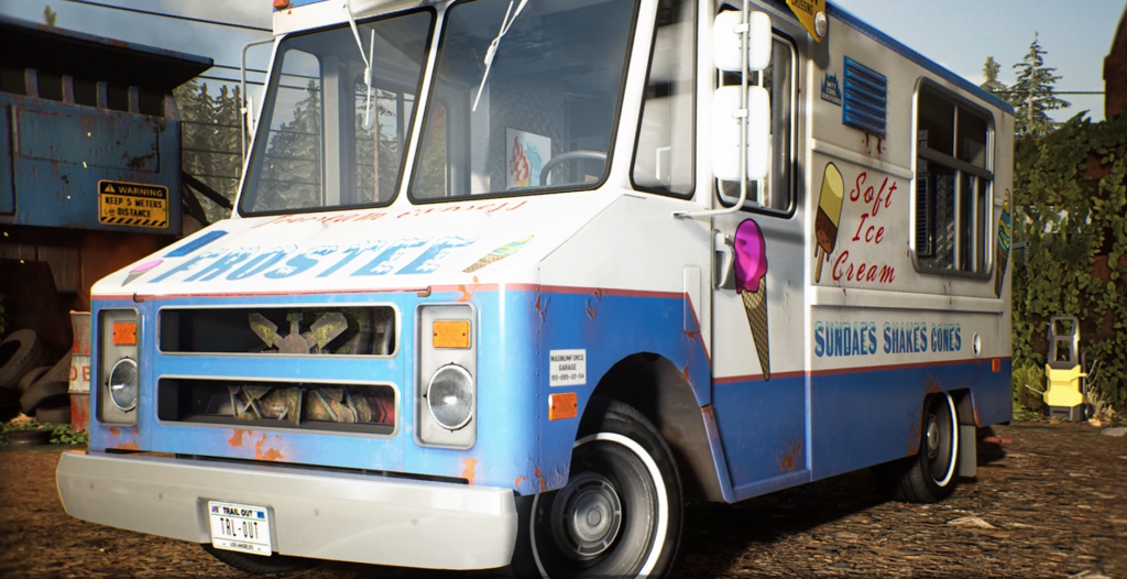 Blue and white ice cream truck parked outdoors