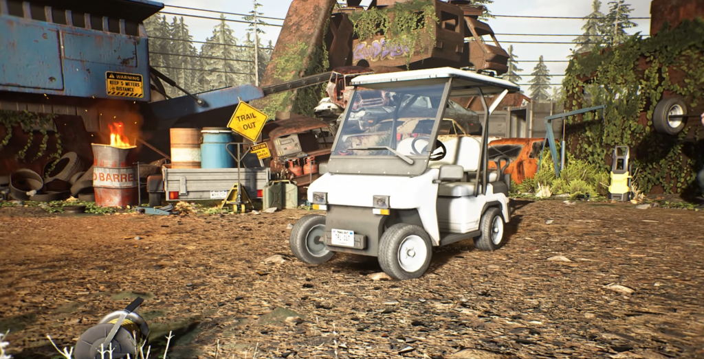 White golf cart parked in scrapyard lot