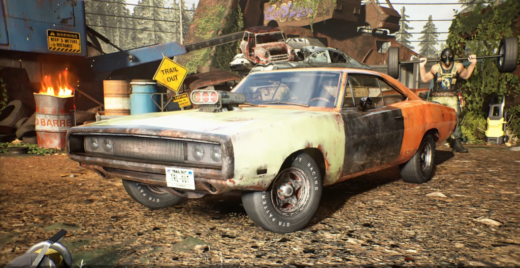 Rusty orange muscle car parked in scrapyard