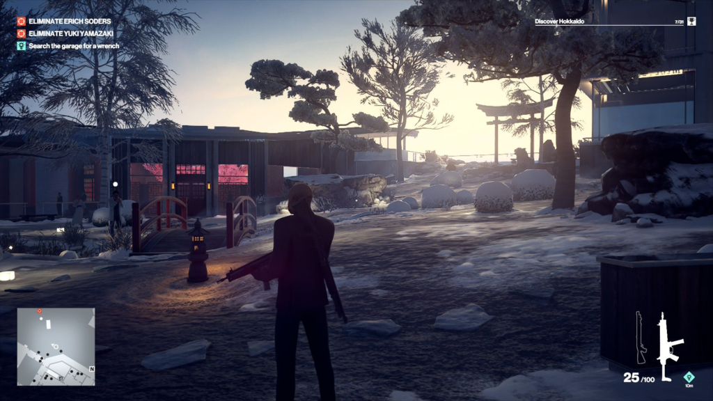 Hitman Agent 47 stands in snowy Japanese garden