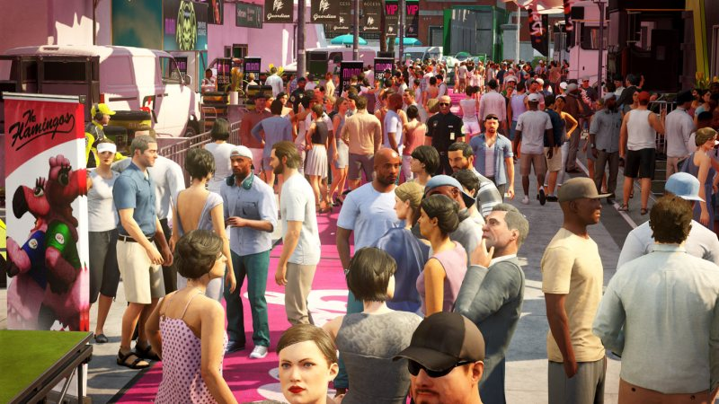 Crowd walking through outdoor festival street with banners