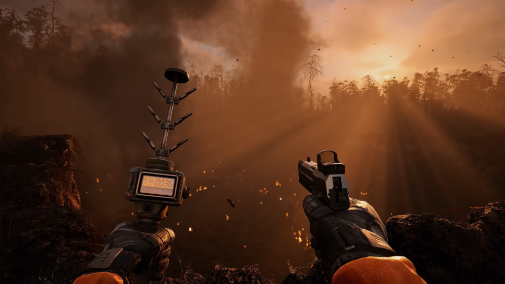 Holding pistol and detector in smoky forest fire at sunset