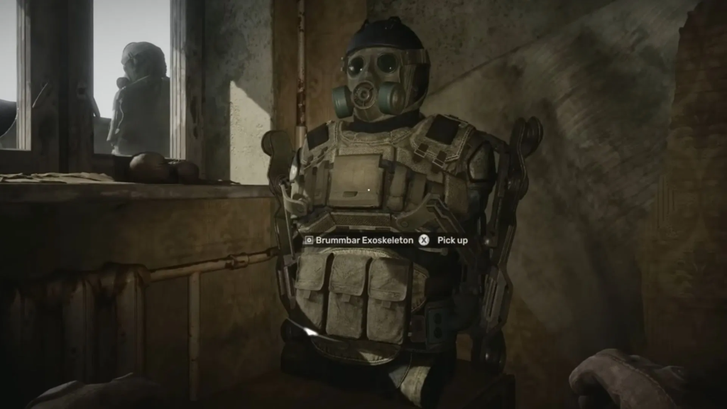 Soldier wearing gas mask in room