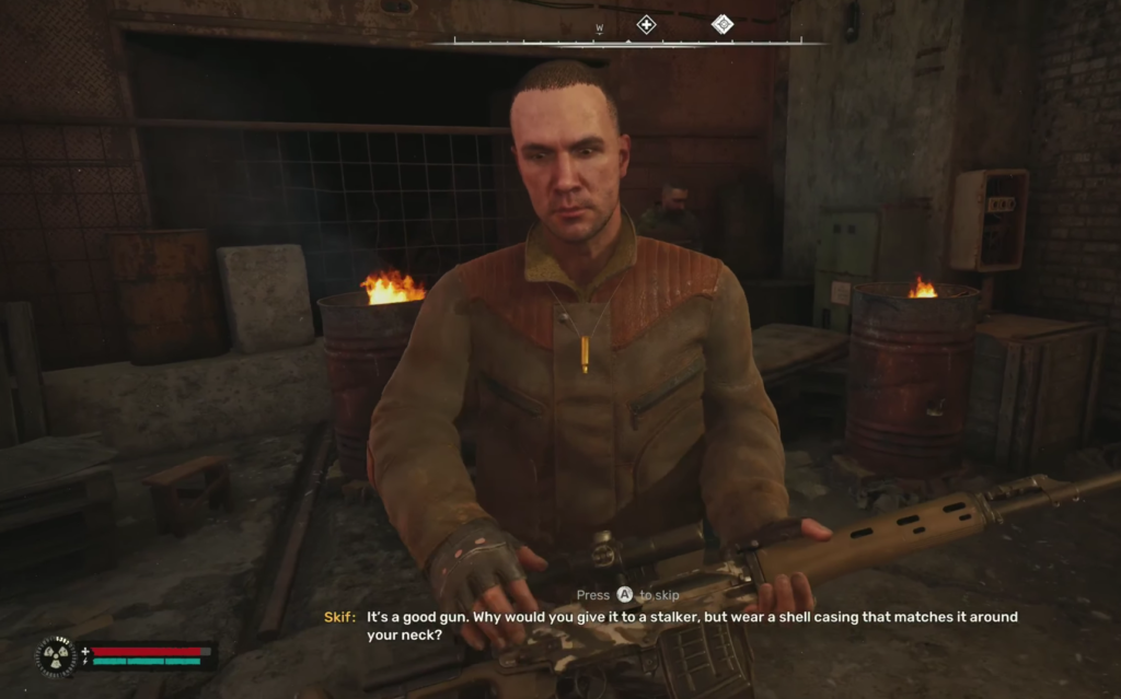 Skif holds rifle in industrial room