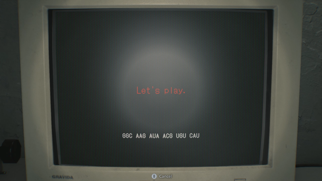 Monitor displaying “Let’s play” message indoors