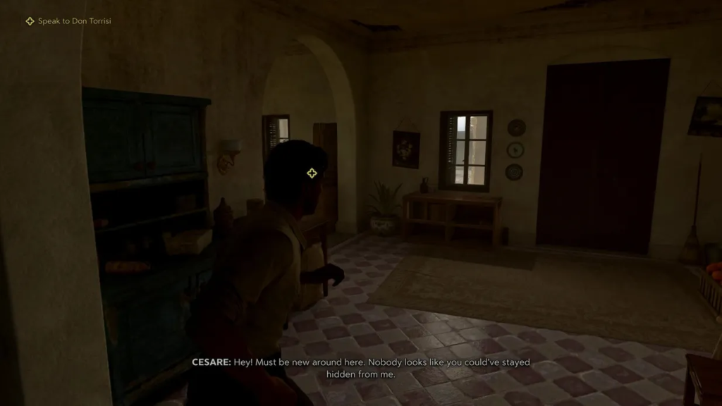Player character sneaking inside dimly lit house hallway