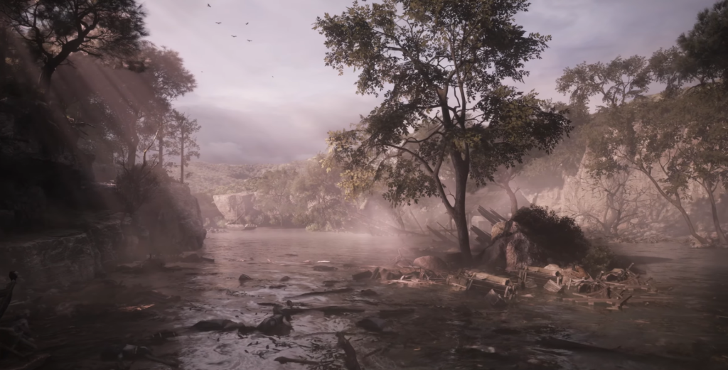 Misty river flows past trees and rocky shore