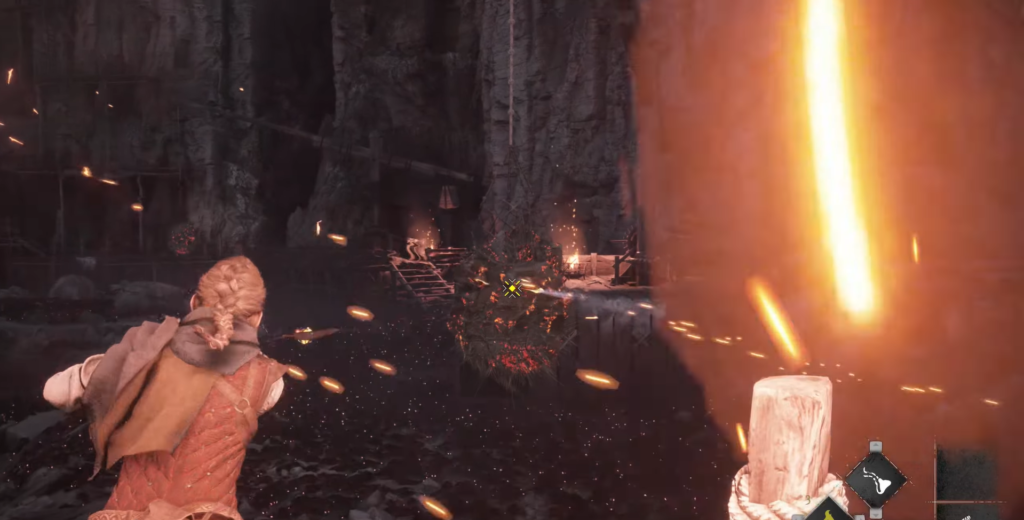 Amicia throws fire at rats in cave, A Plague Tale
