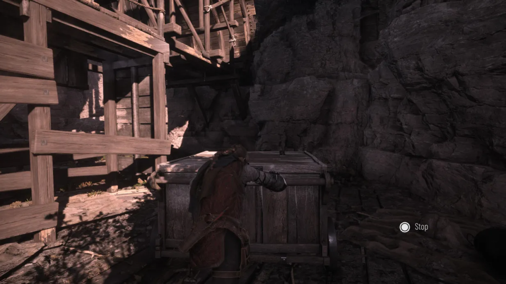 Character pushing crate in rustic wooden setting.