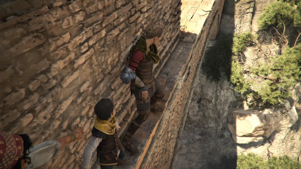 Characters navigating a narrow stone ledge.