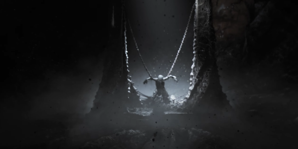 Kratos God of War chained in dark environment.