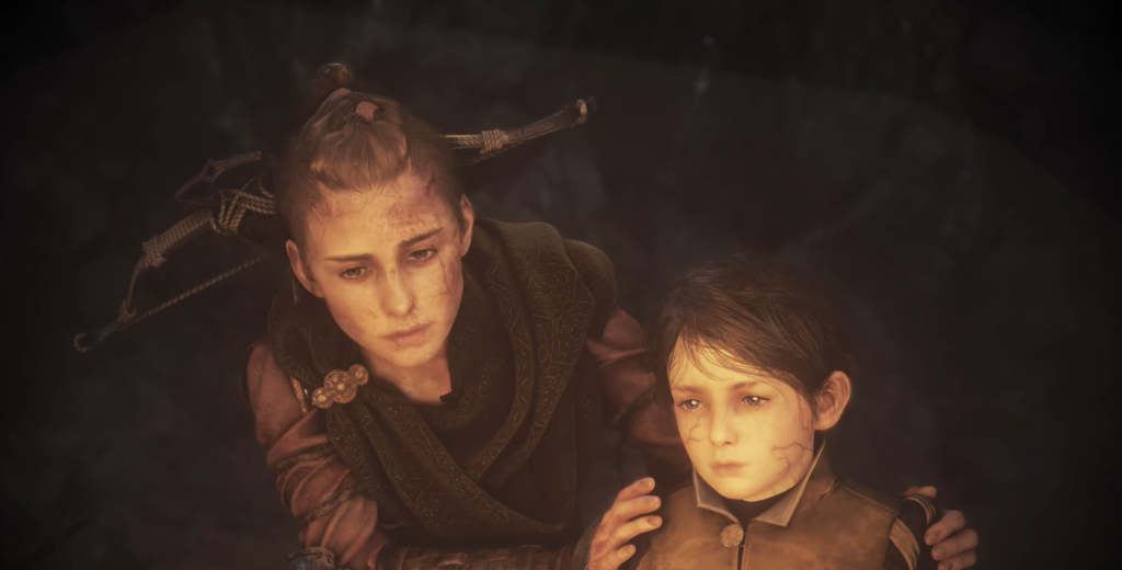 Amicia from A Plague Tale comforts young Hugo.