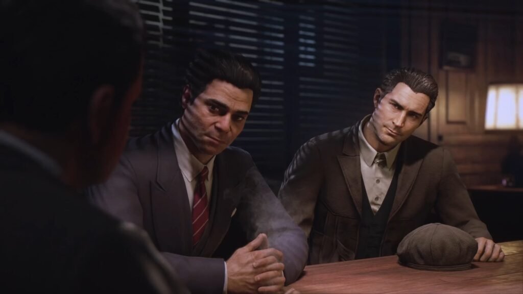 Two men sitting at table in office