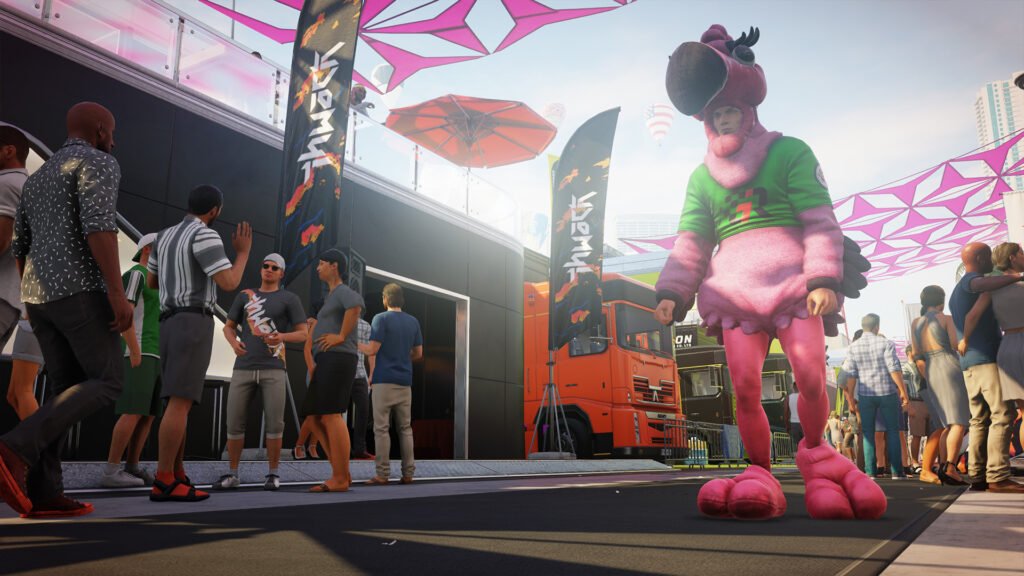 Person in pink bird costume walking at festival crowd