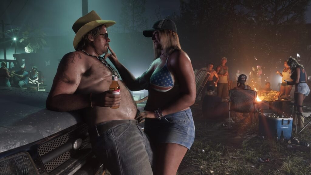 Woman touches shirtless man by truck at bonfire party