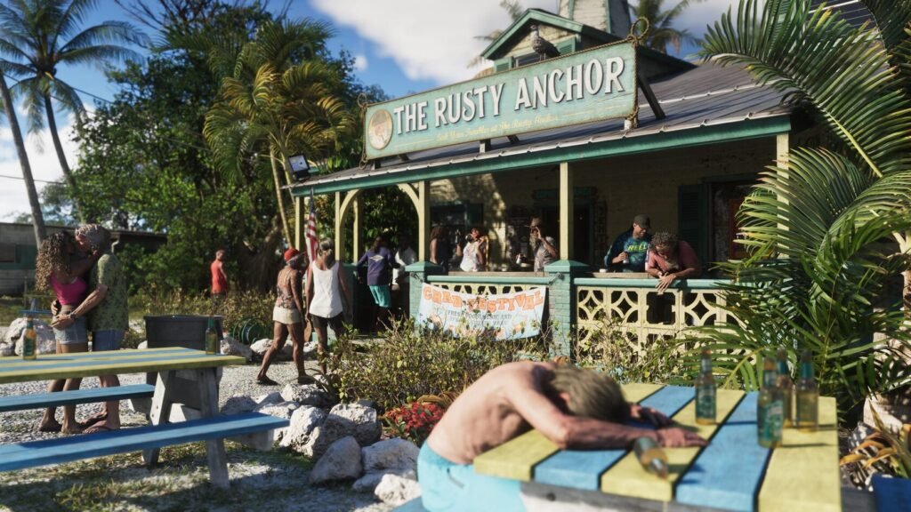 People gather outside The Rusty Anchor bar in tropics